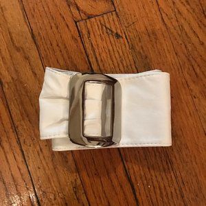 White pleather belt with silver buckle